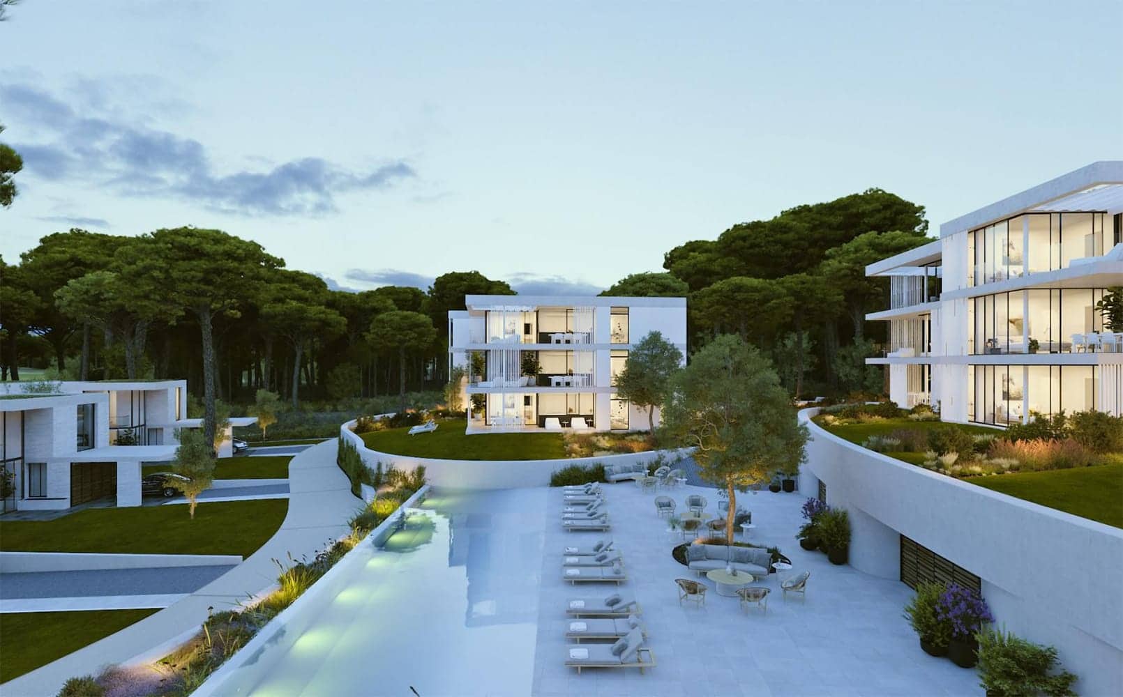 Zona común exterior con piscina de los apartamentos equipados con ventanas minimalistas en PGA Catalunya | Alumilux