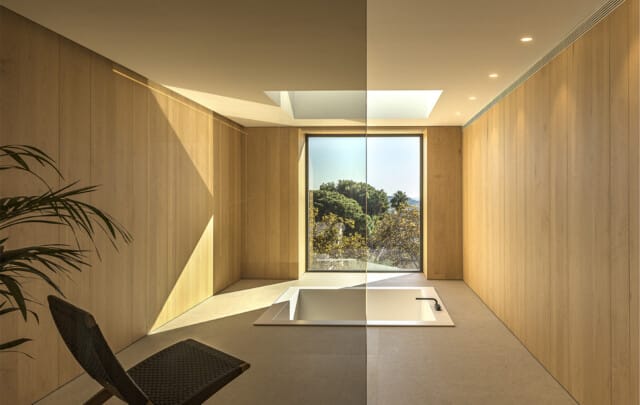 Casa en Pedralbes | Bañera integrada a ras de suelo frente a  ventana Ottima | bAR Arquitectura